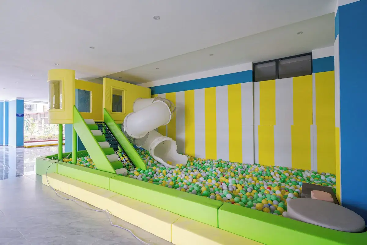 Colorful children's play area with ball pit and slide