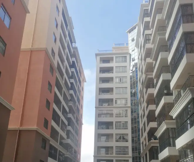 Multi-story residential buildings with modern facade and balconies
