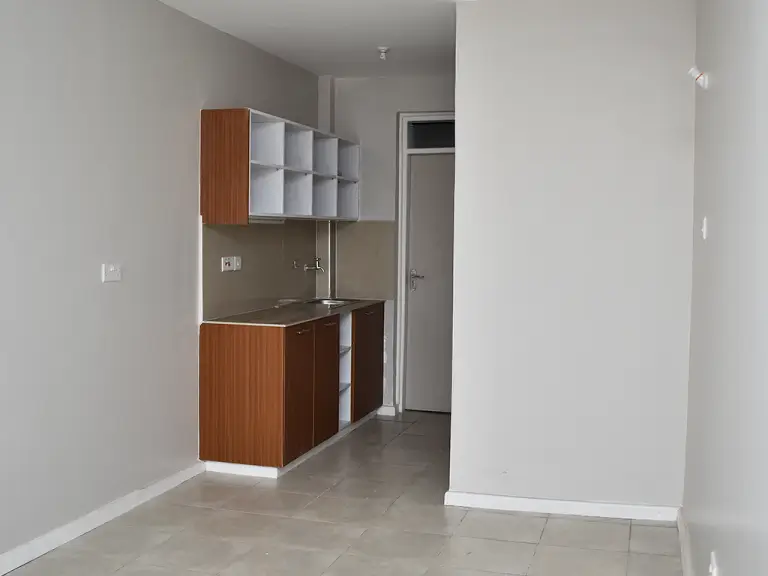 Compact kitchen with wooden cabinetry and white upper shelving