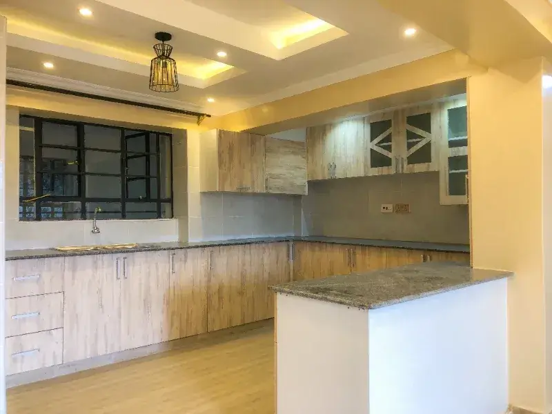 Modern open-plan kitchen with island and dining area