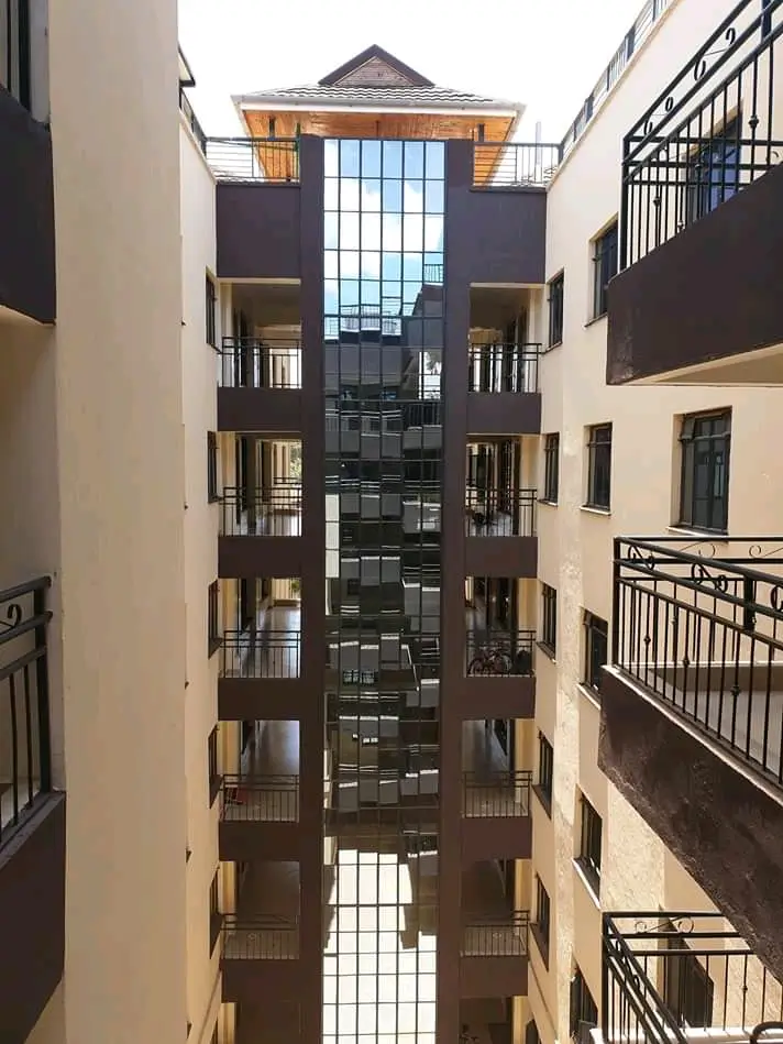 Multi-story interior atrium with natural light and balconies