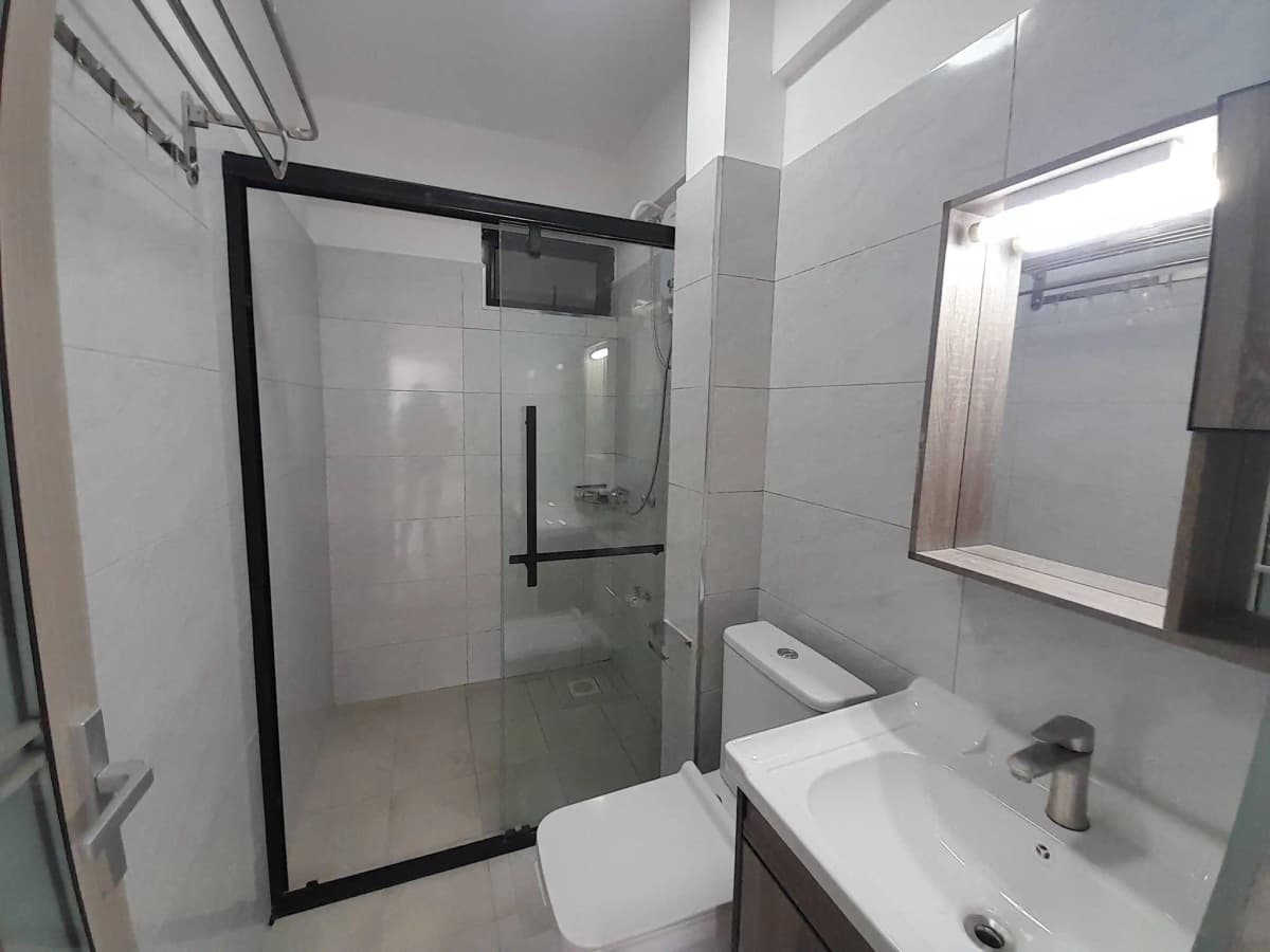 Modern bathroom with walk-in shower and vanity sink