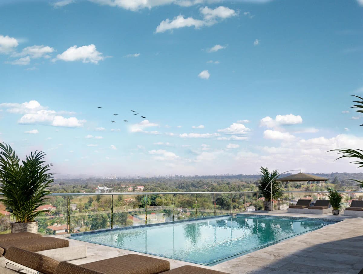 Rooftop infinity pool overlooking sprawling city landscape