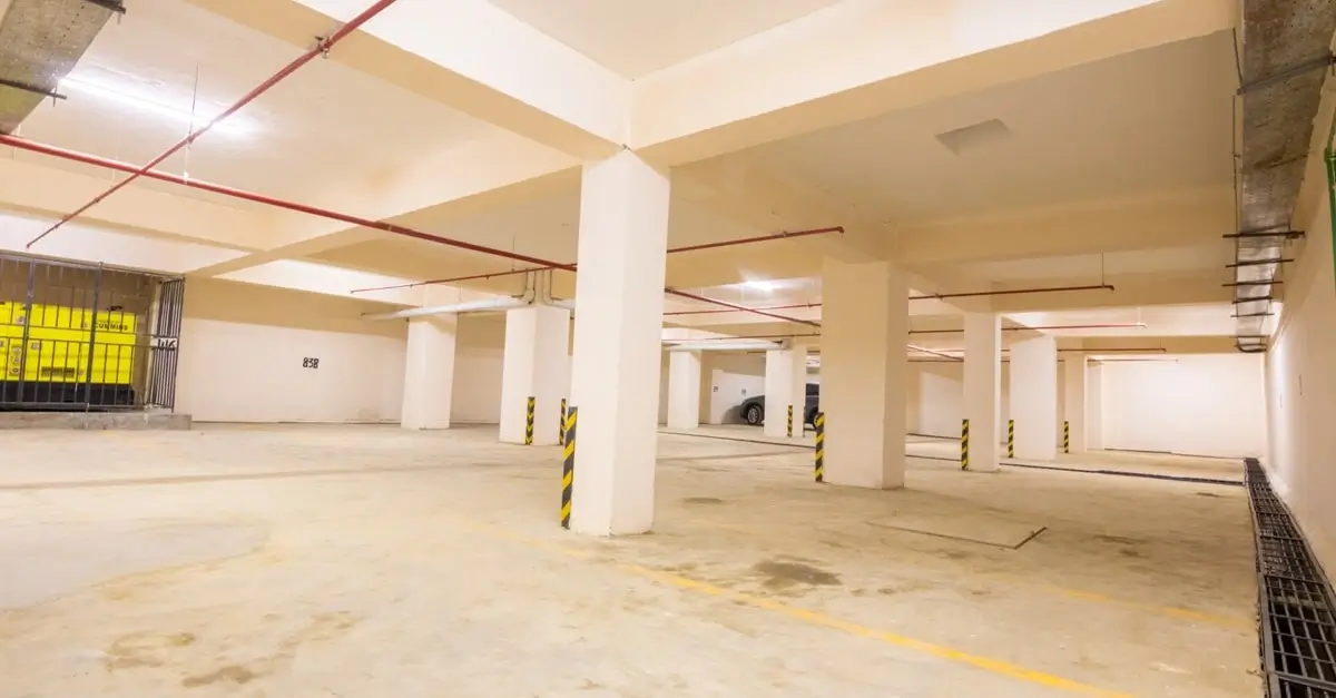 Large underground parking garage with support columns
