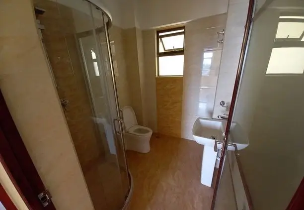 Contemporary bathroom with walk-in shower and dual vanity