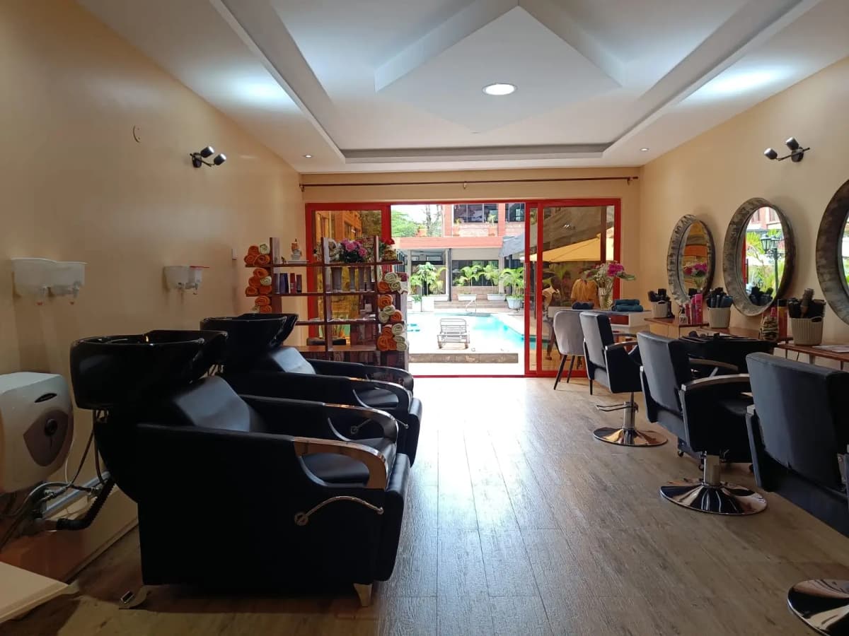 Commercial salon lobby with seating and styling stations