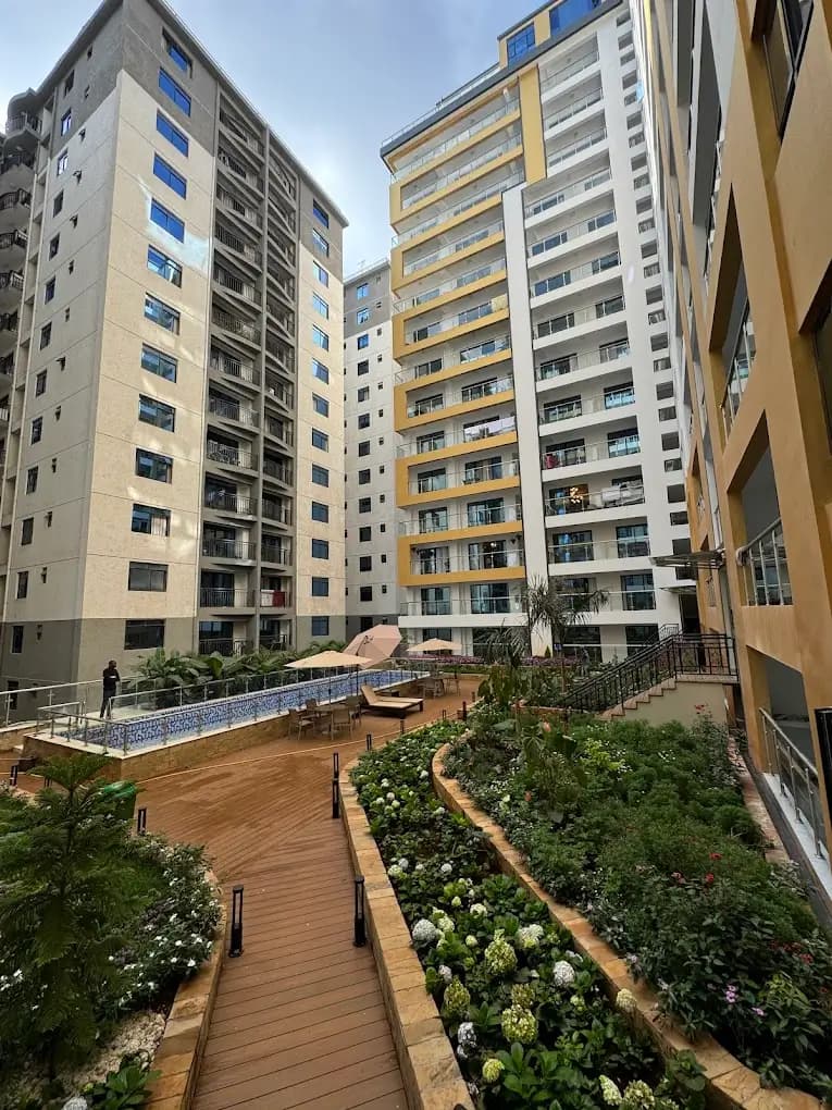 Landscaped compound garden with wooden deck pathways