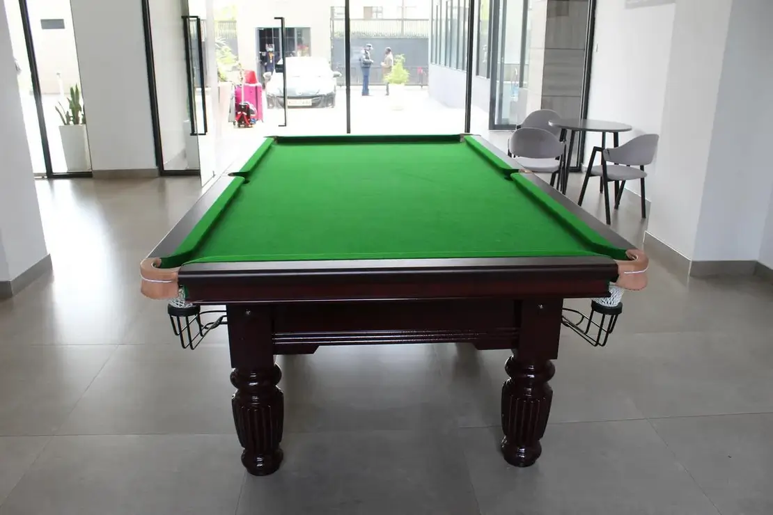 Modern lobby with pool table and lounge seating