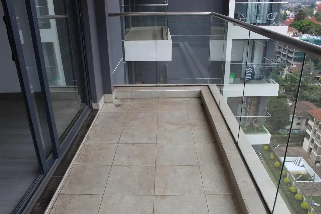 Spacious balcony with city and compound views