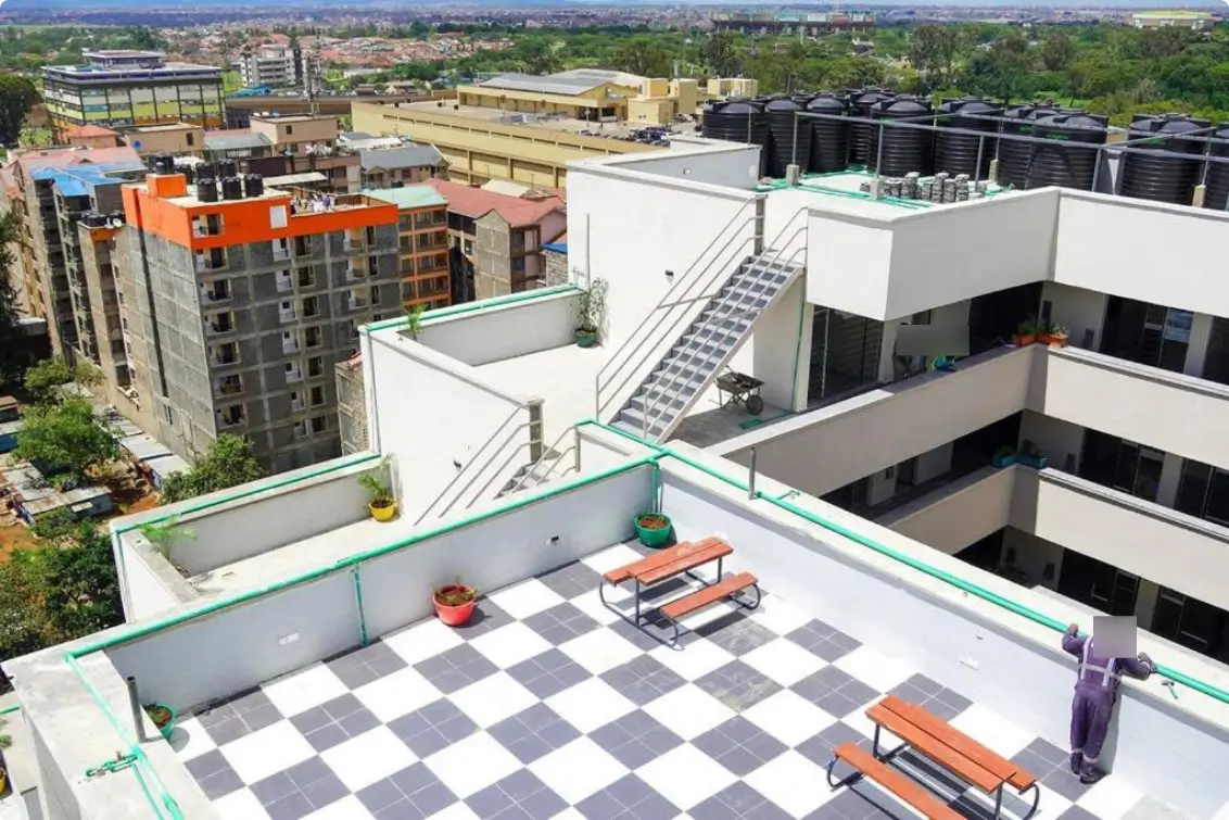 Rooftop parking area with checkered floor pattern