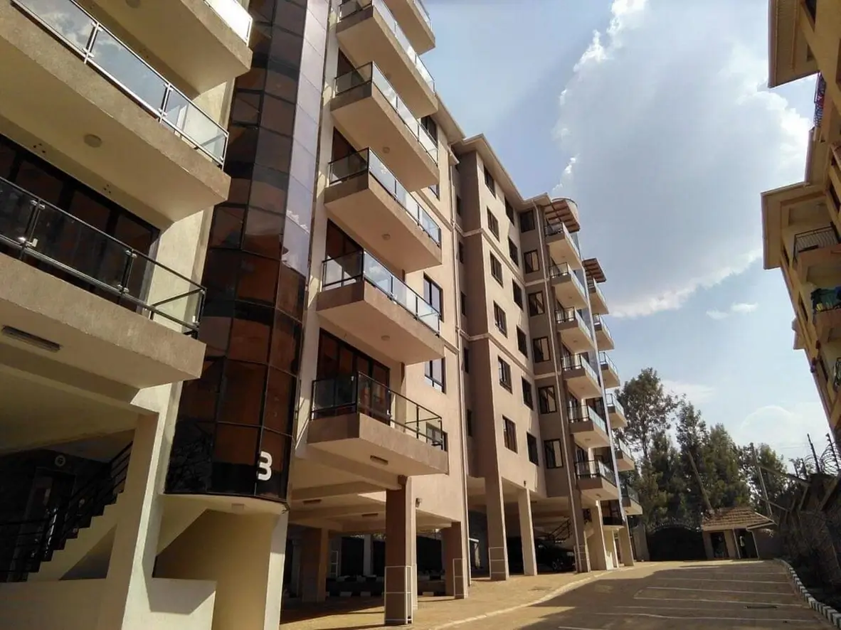 Multi-story residential building with modern facade and open ground floor