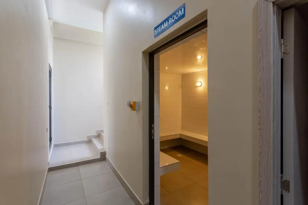 Building corridor with steam room entrance visible