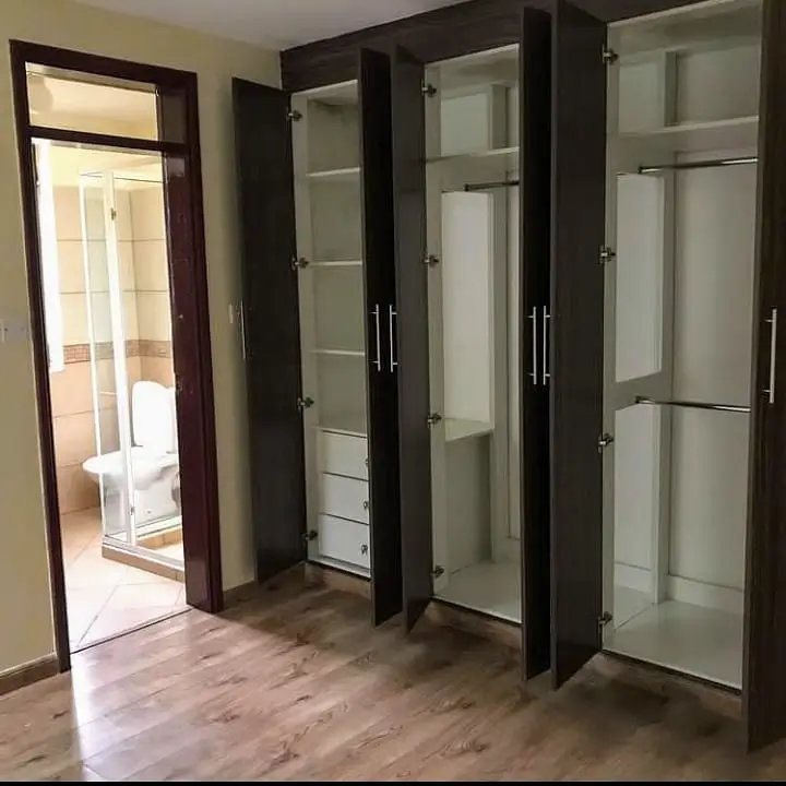 Master bedroom with built-in wardrobes and ensuite bathroom access