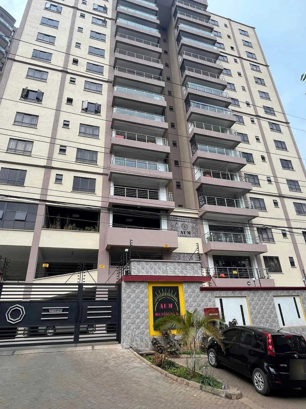 Multi-story residential building with ground-floor commercial space