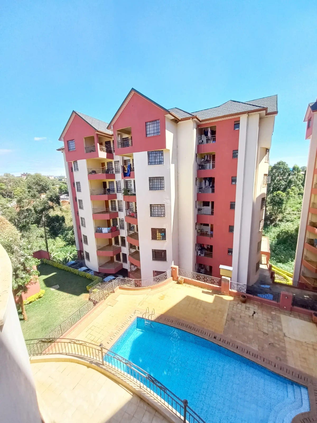 Residential compound with swimming pool and multi-story buildings