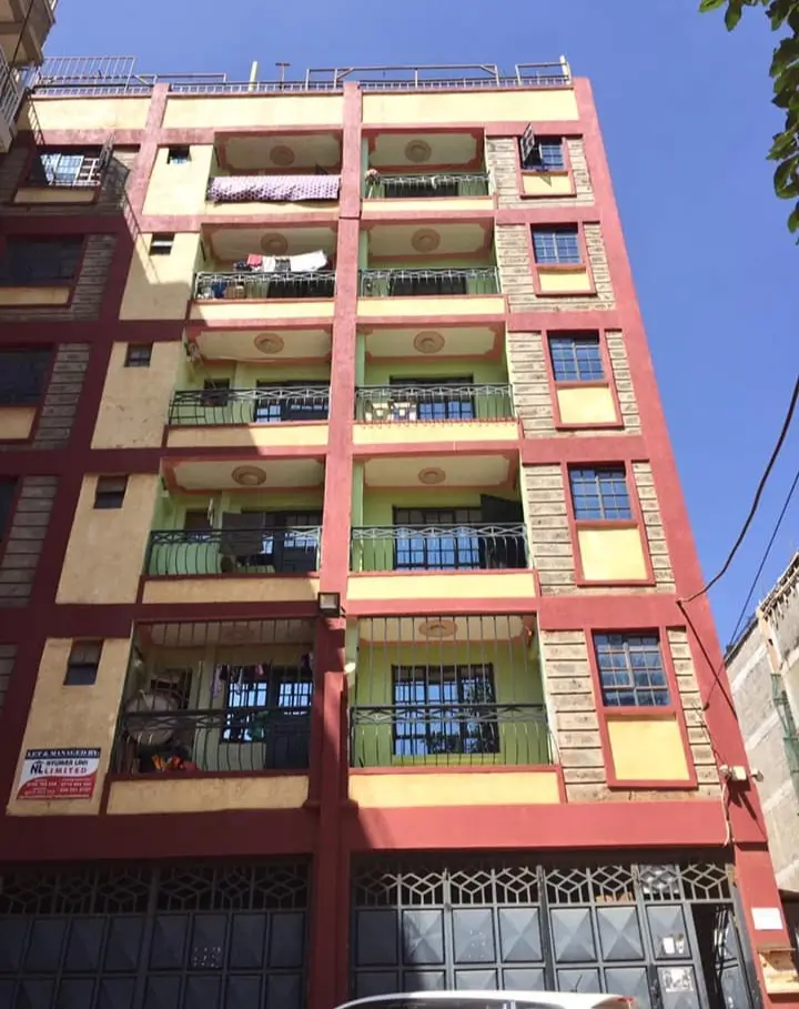 Multi-story residential building facade with balconies