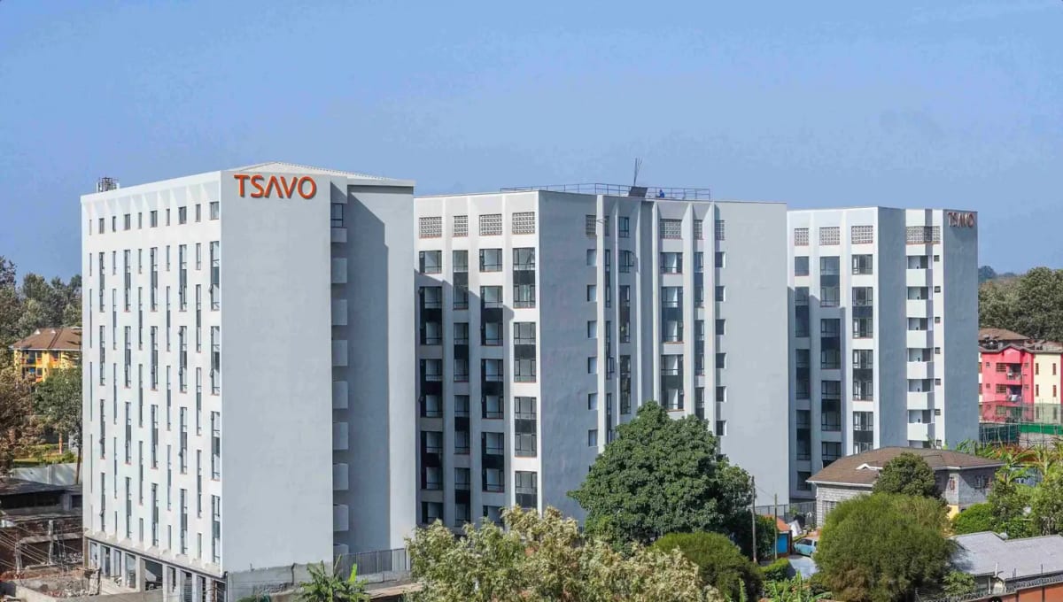 Modern multi-story residential building with TSAVO branding