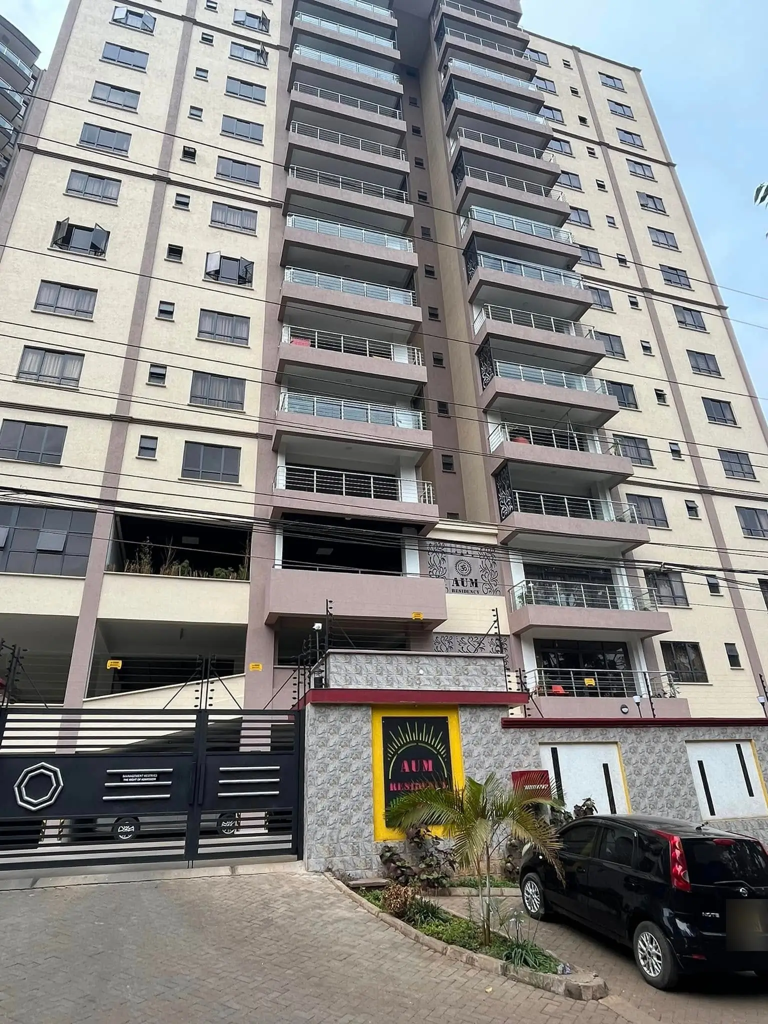 Multi-story residential building with ground-floor commercial space