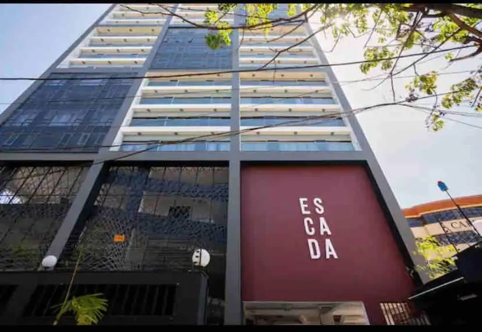 Modern multi-story residential building facade with balconies
