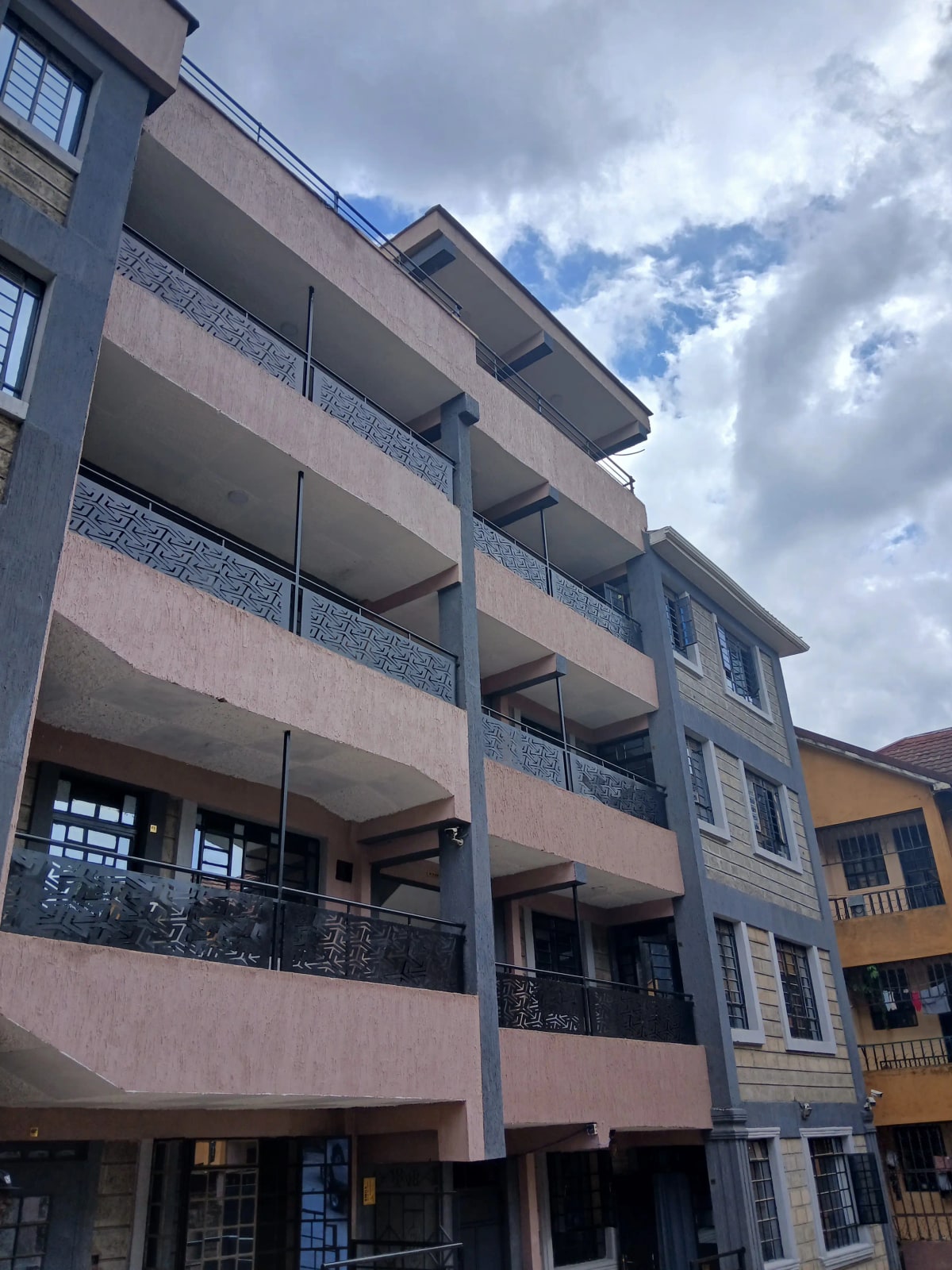 Multi-story residential building facade with balconies