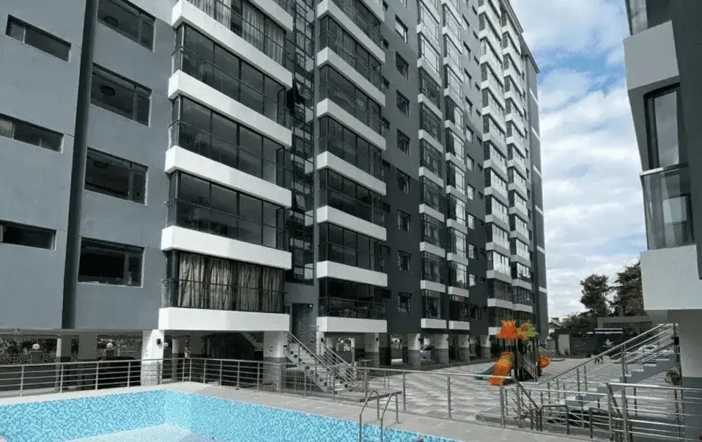 Modern residential complex with bright blue swimming pool