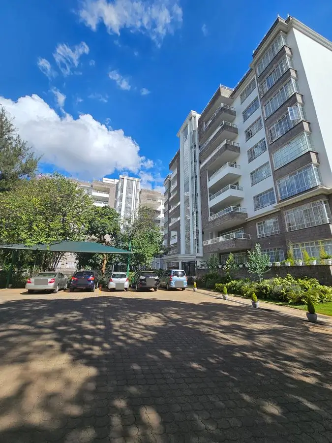 Multi-story residential apartment building with compound parking