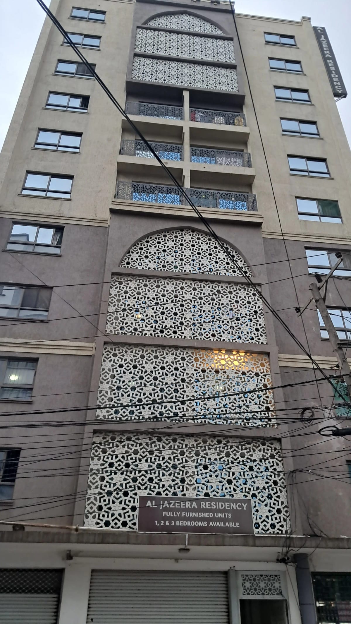 Multi-story residential building facade with balconies