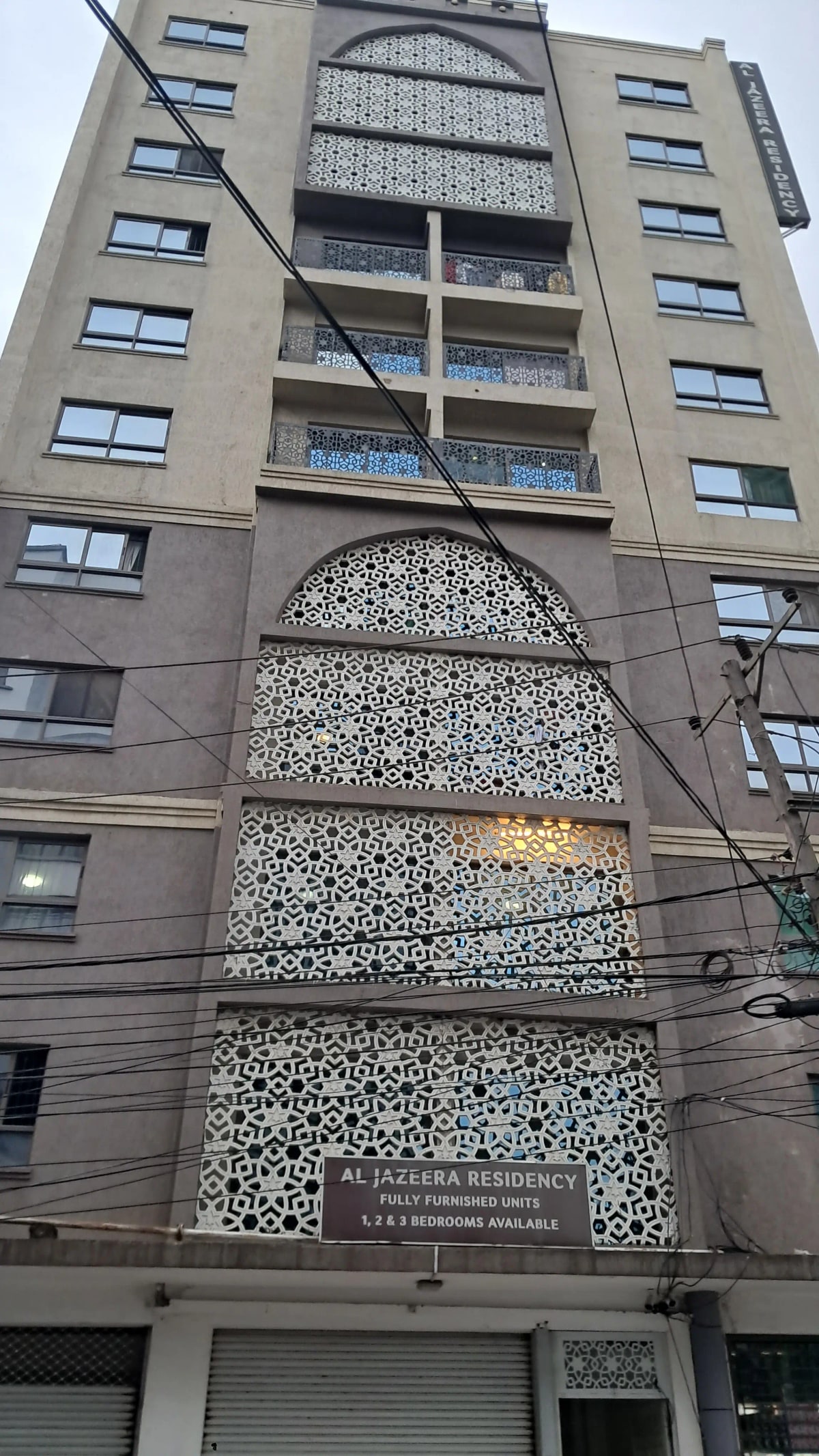 Multi-story residential building facade with balconies