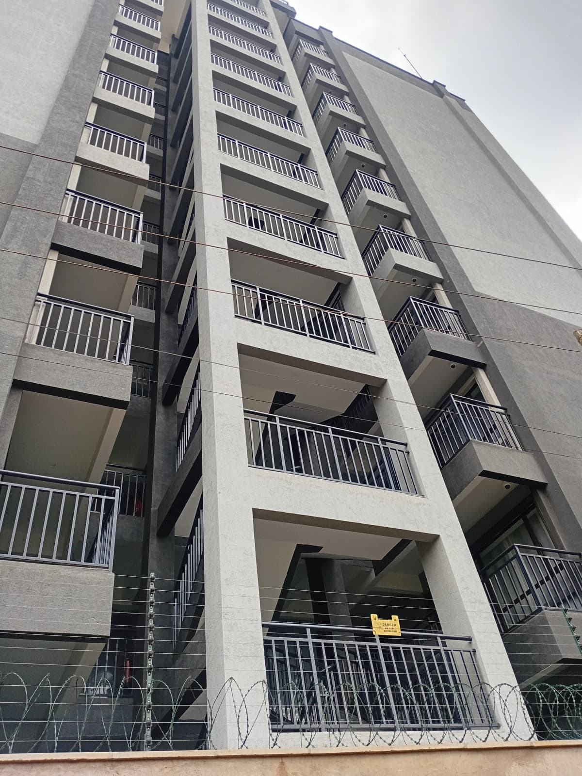 Modern multi-story residential building with balconies