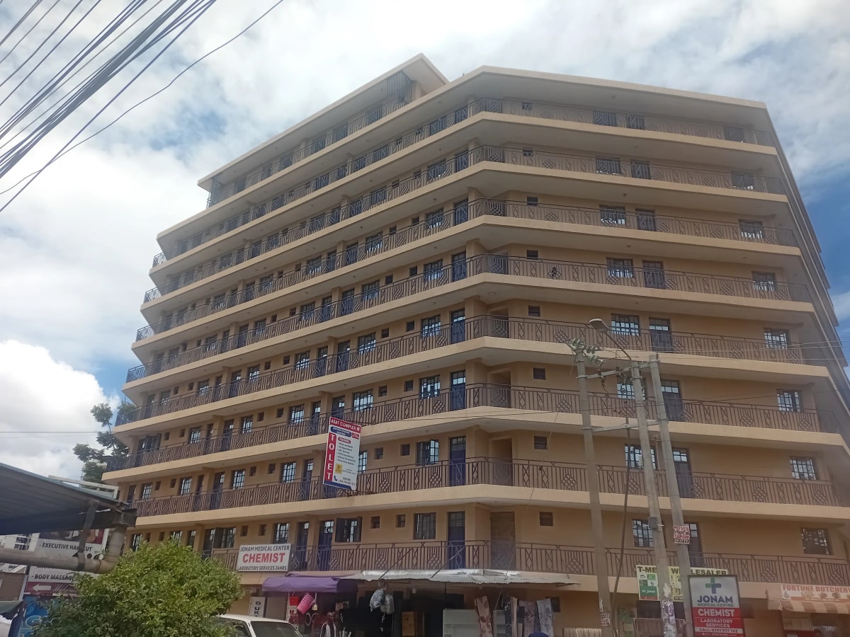 Multi-story residential building facade with balconies