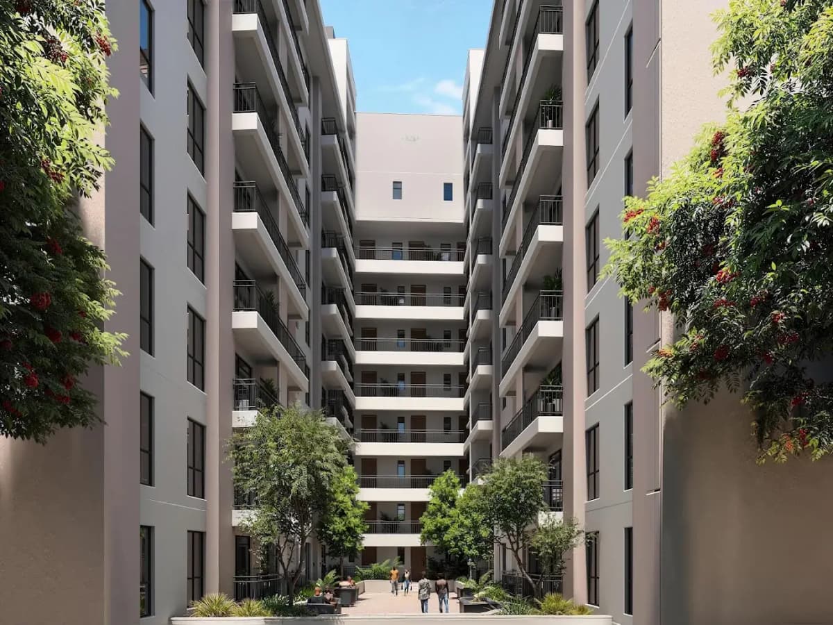 Multi-storey apartment block with landscaped central courtyard