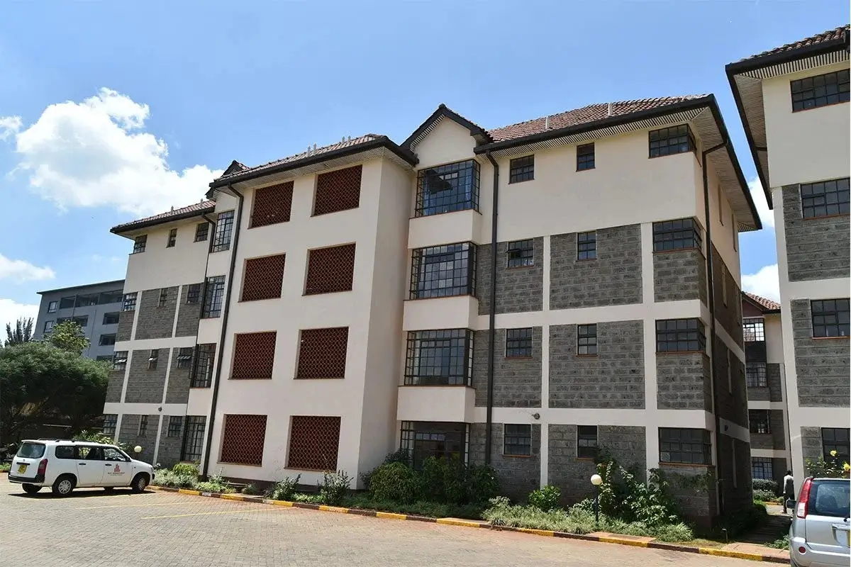 Multi-story residential apartment building with stone facade