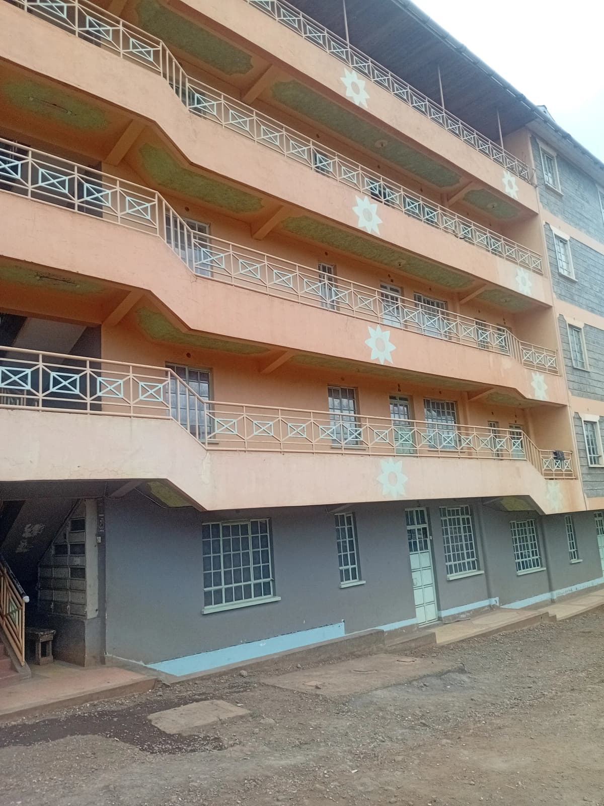Multi-story residential building facade with balconies
