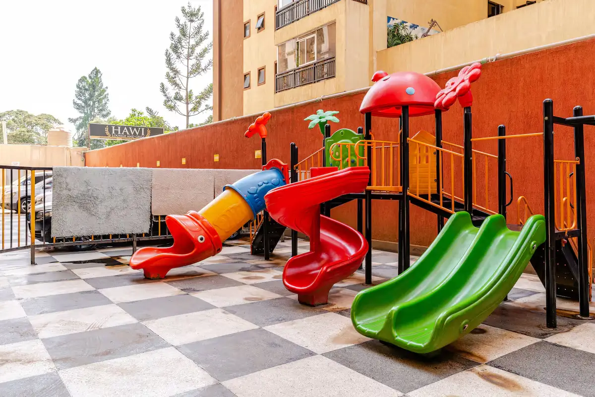 Children's playground with colorful slides and climbing structures