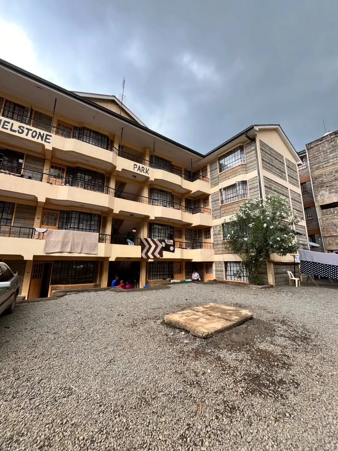 Multi-story residential building with compound courtyard