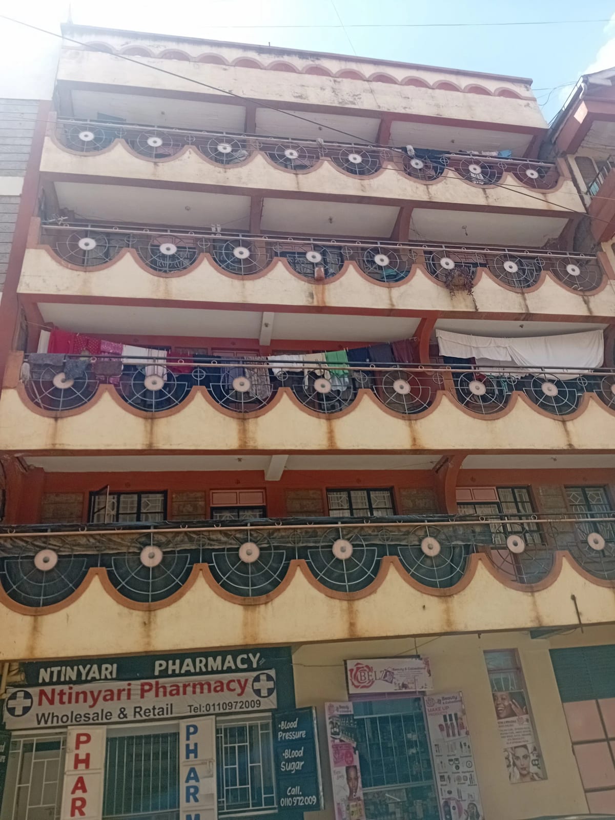 Commercial building facade with decorative bunting and signage