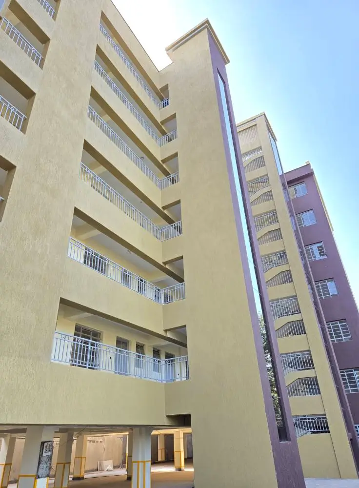 Multi-story residential building facade with balconies