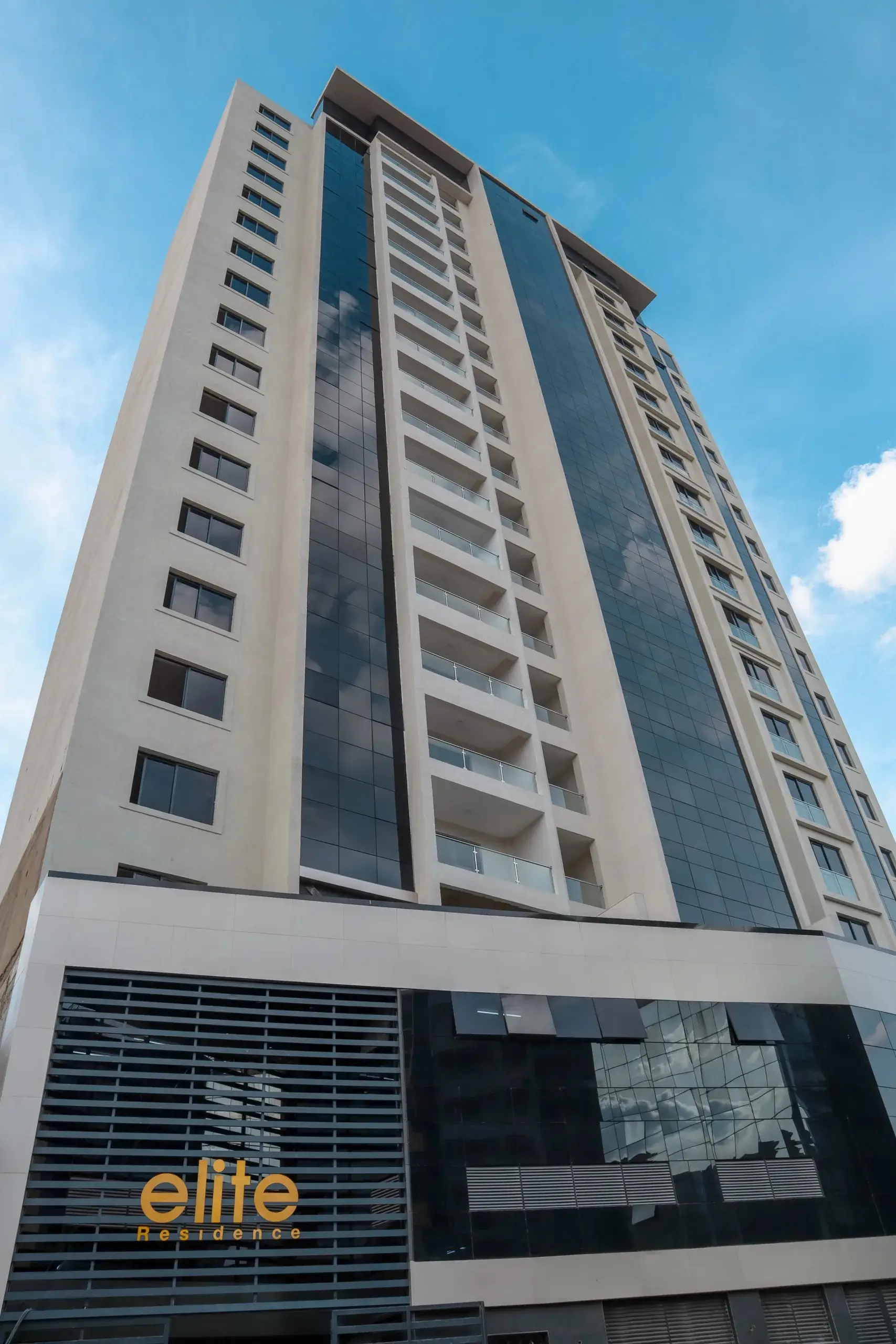 Modern multi-story residential building facade with balconies