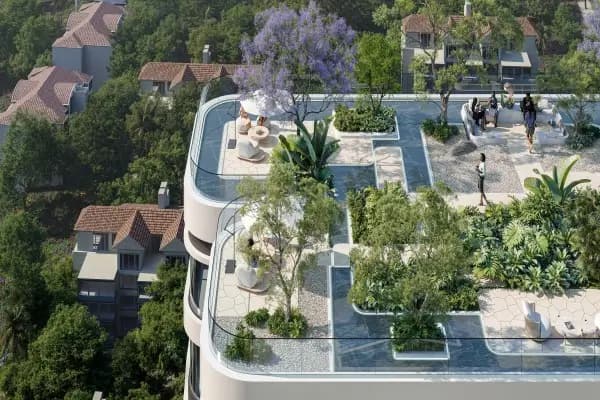 Lush rooftop garden terrace with trees and seating