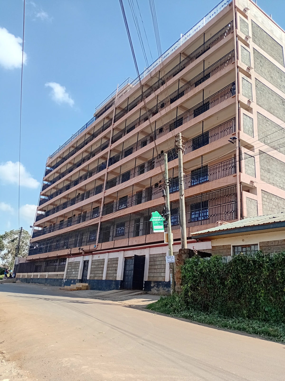 Multi-story residential building facade with balconies
