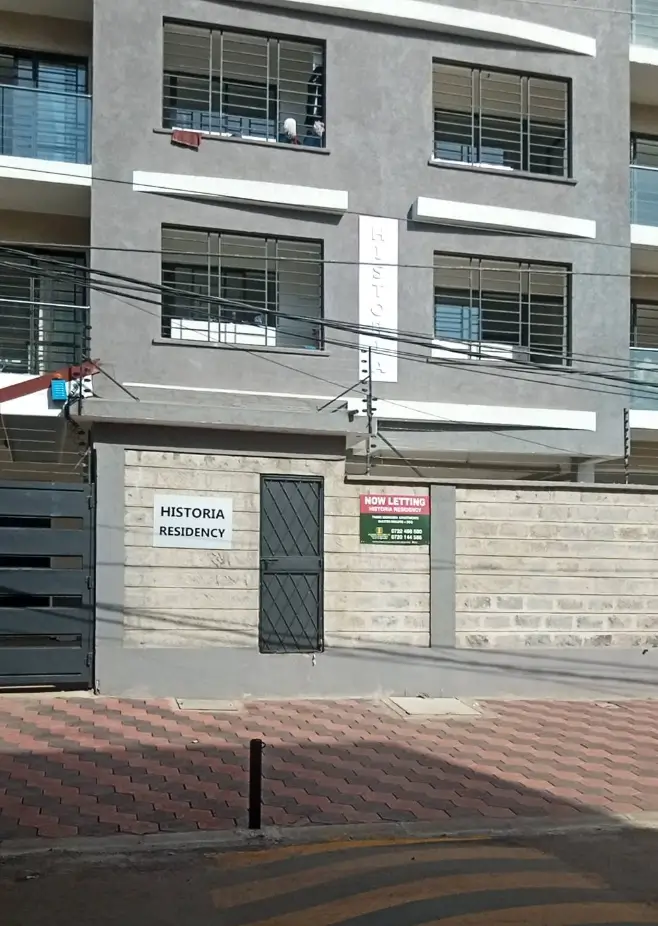 Modern residential building facade with secure ground-floor entrance