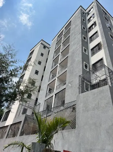 Modern multi-story residential building facade with balconies