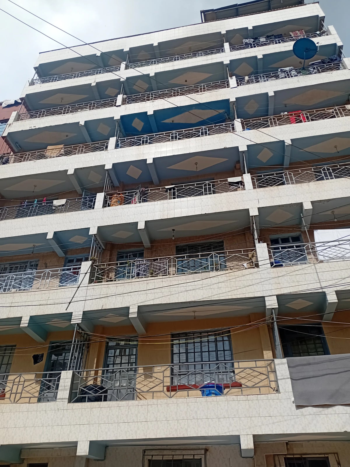Multi-story residential building facade with balconies
