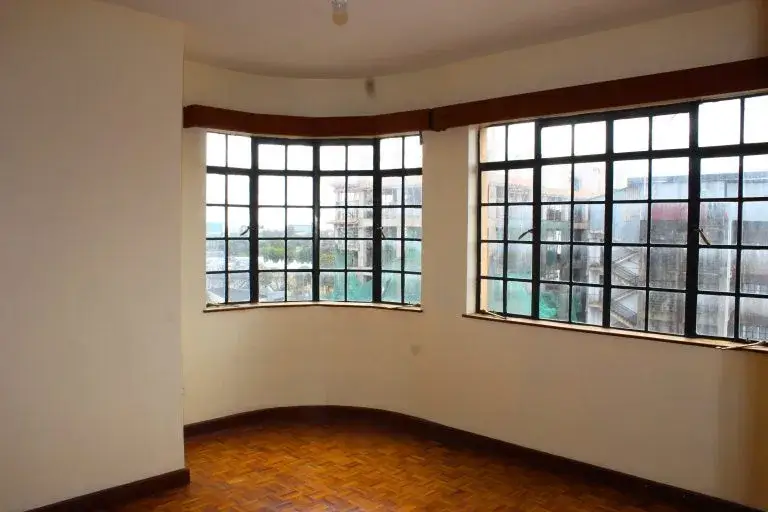 Curved windows with expansive city and landscape views