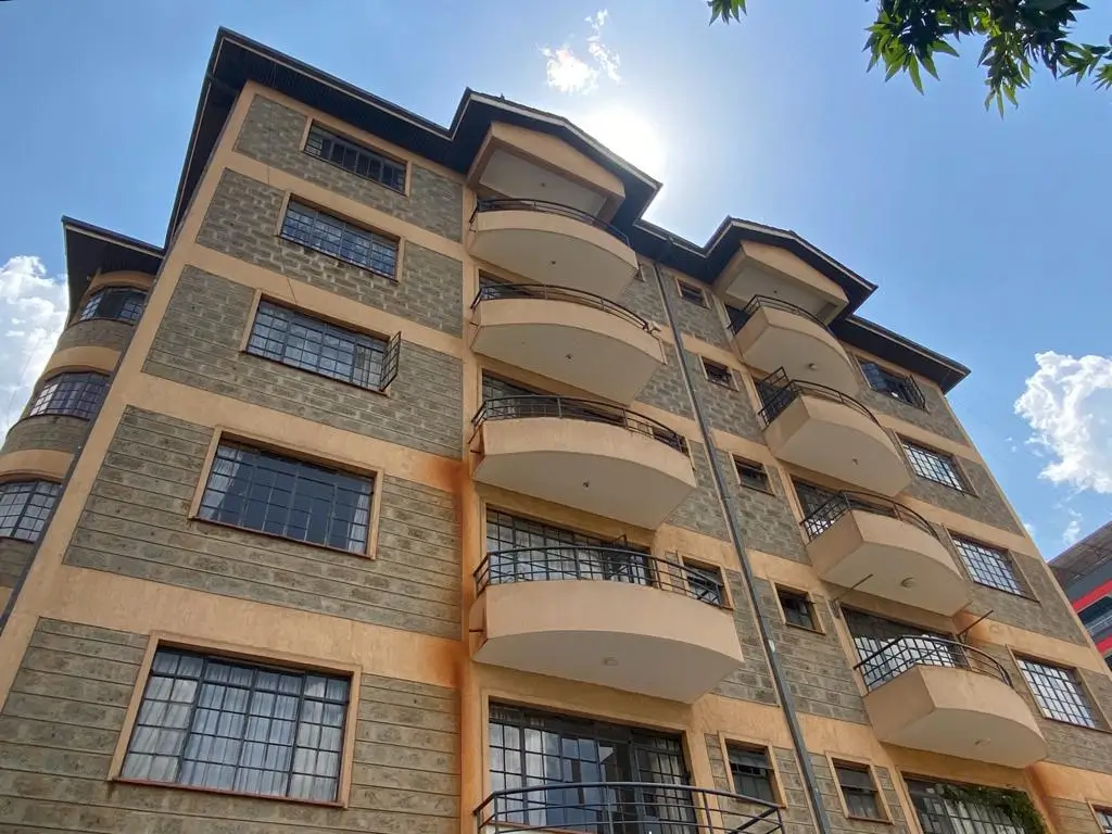 Multi-story residential building facade with balconies