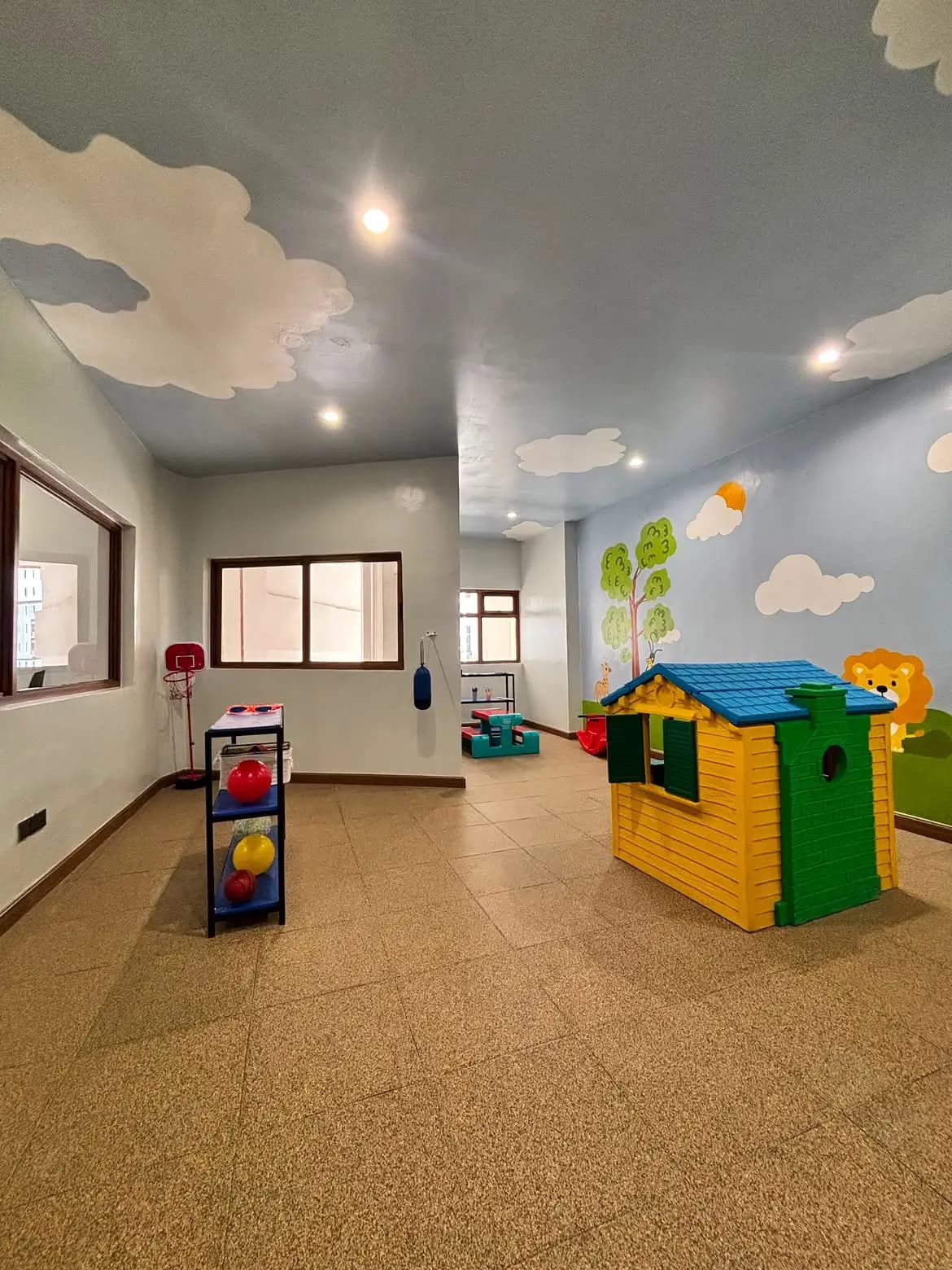 Colorful indoor children's play room with toy house