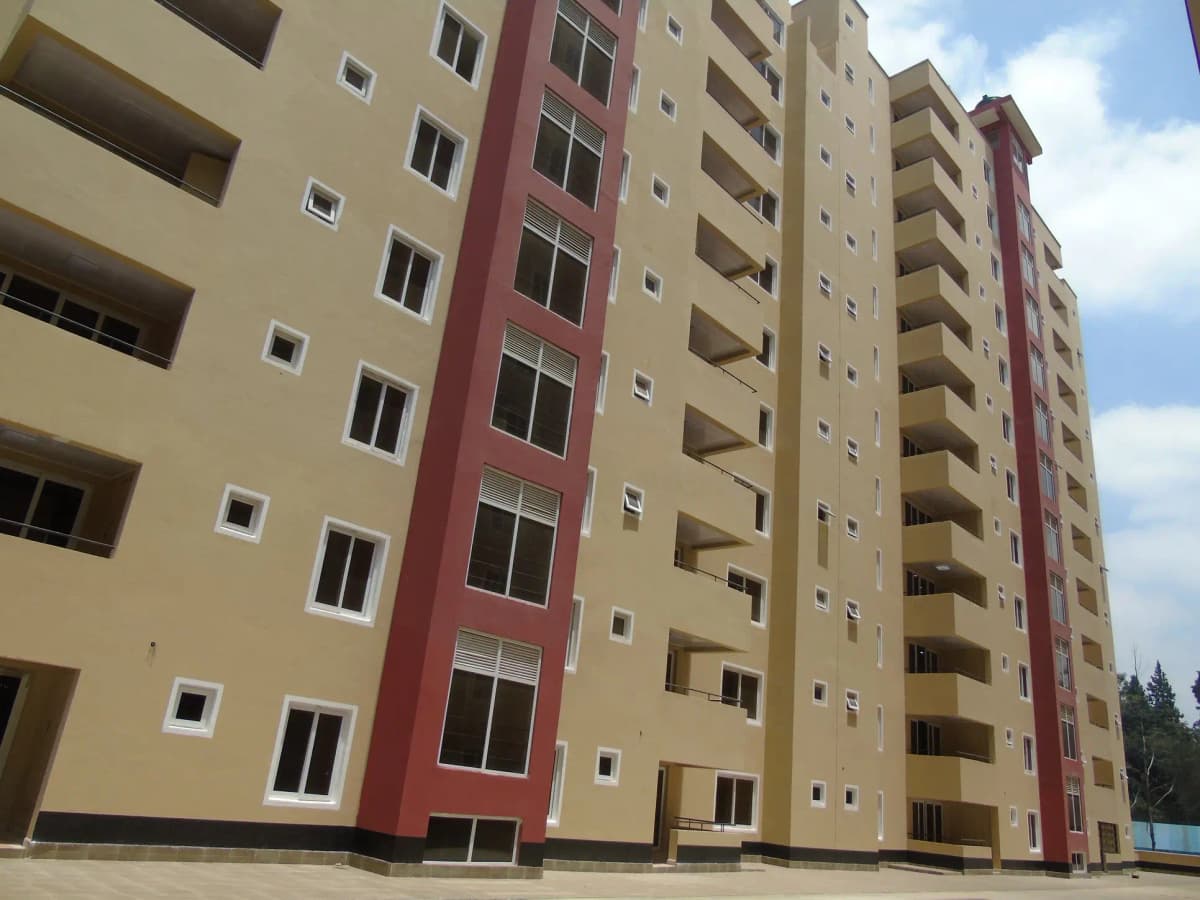 Multi-story apartment building facade with balconies and windows