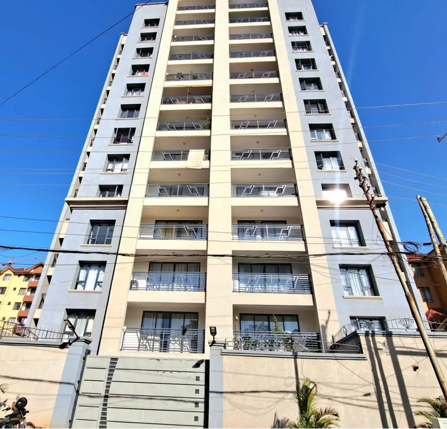 Modern multi-story residential building facade with balconies
