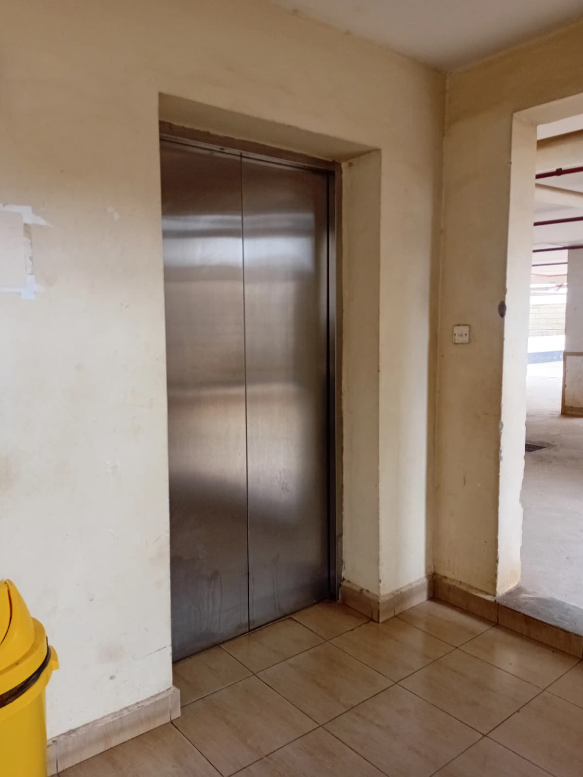 Building lobby with stainless steel elevator doors