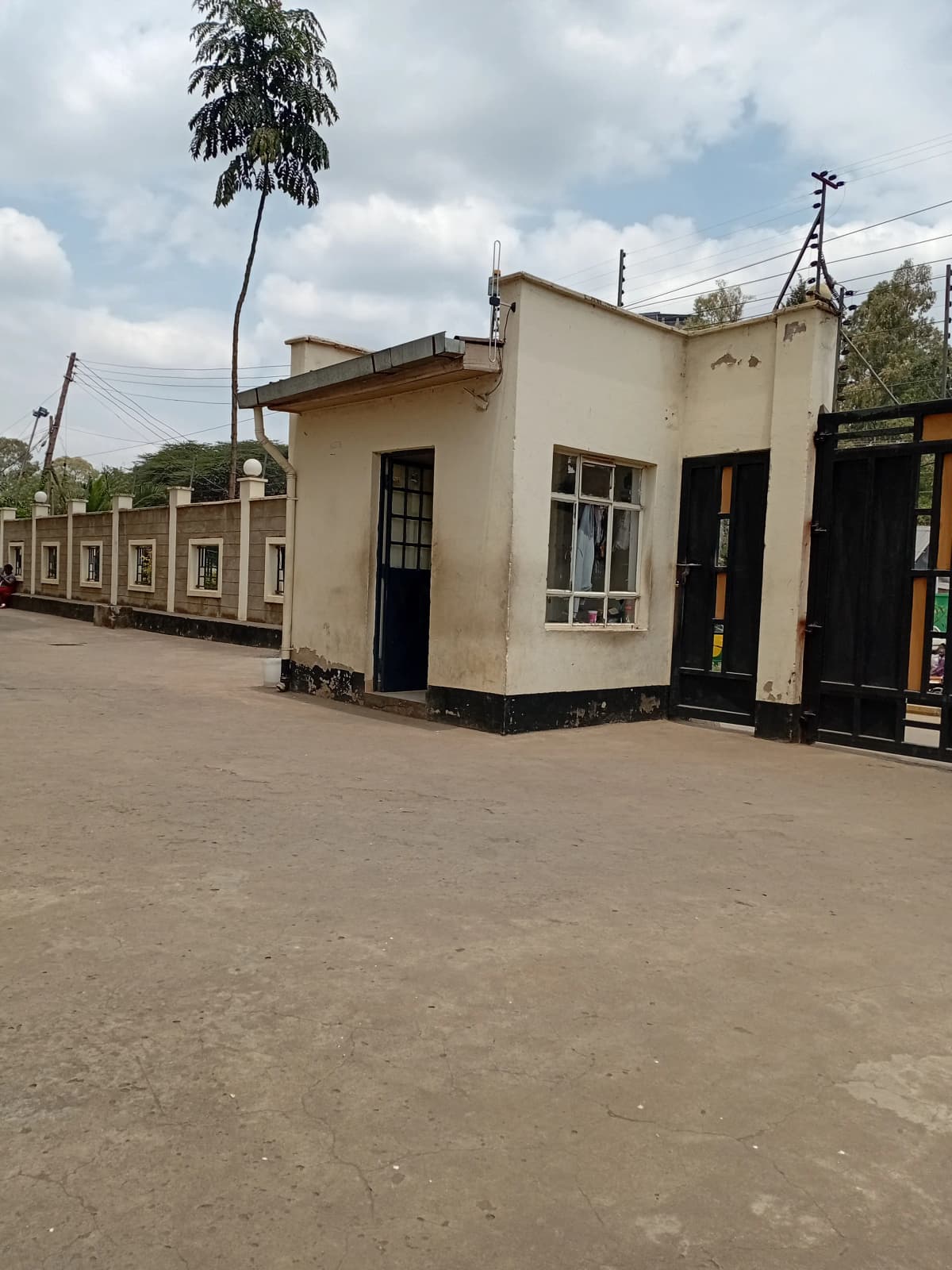 Cream and black residential units with black doors and windows